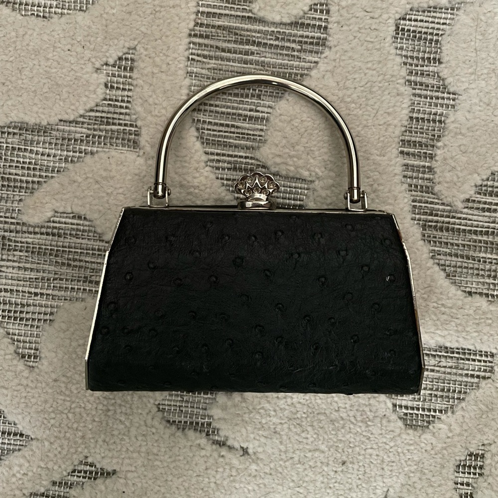 Tiny clutch bag with handle. - Picture 1 of 4